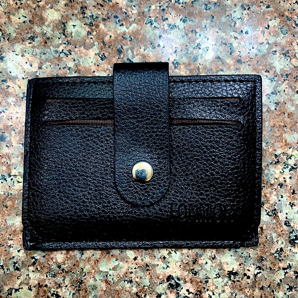 black wallet for cash, cards and coins